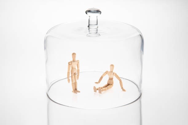 istock Wooden dummies under a glass dome 1240074643