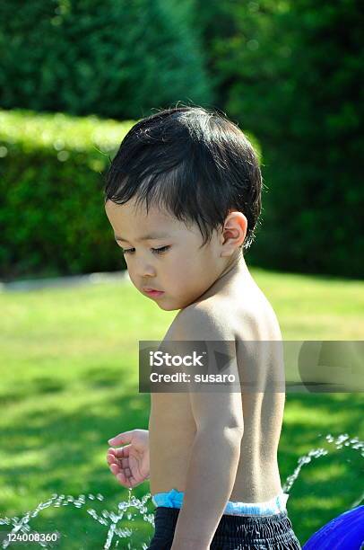 Fun In The Sun Stock Photo - Download Image Now - Asian and Indian Ethnicities, Backgrounds, Boys