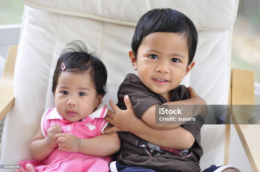 Brother and Sister 12-17 Months Stock Photo
