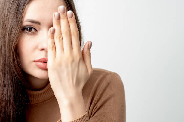 istock Woman covers her face by hand. 1240117147