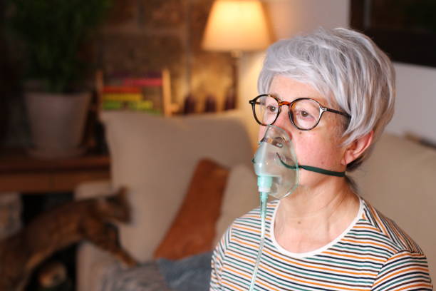 istock Senior woman receiving oxygen therapy 1240123960