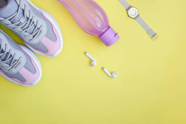 istock Flat lay sport on yellow background. 1240137978