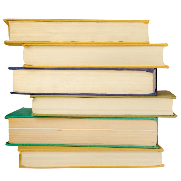 istock Stack of hardcover books isolated on white background. 1240139029