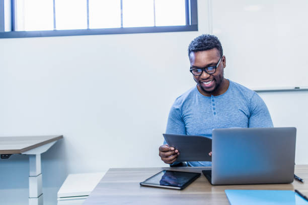 istock Keeping Busy at the Office 1240148135