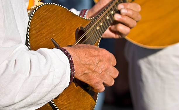 istock man playing on the national musical instrument 124016828