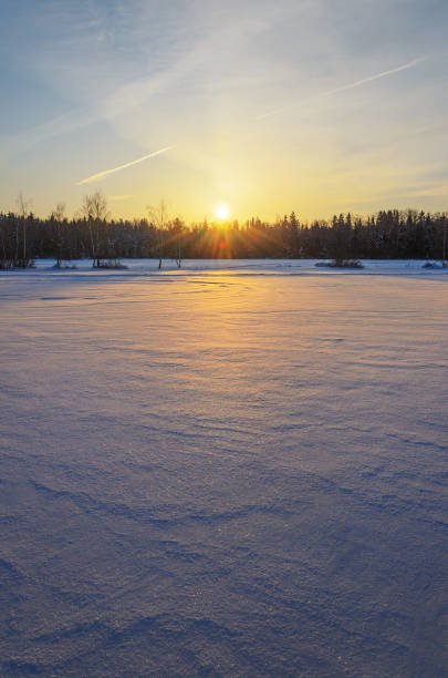 istock Frosty winter nature landscape with rising sun. 1240177457