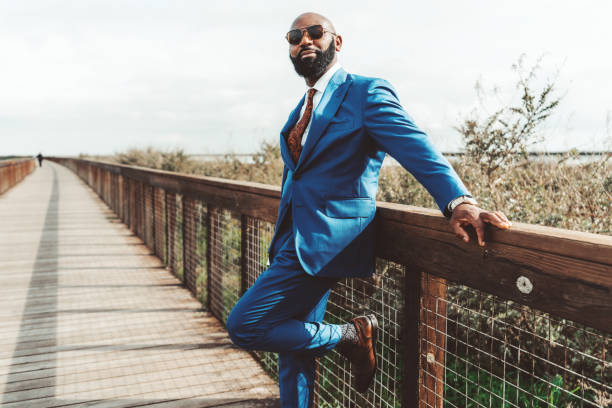 istock African man in a blue elegant suit 1240179604