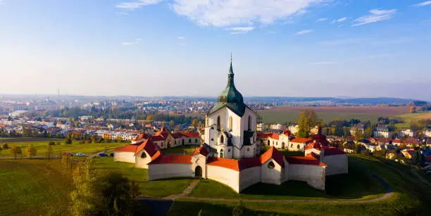 Picturesque aerial view of Czech Zdar nad Sazavou cityscape with Church of Saint John of Nepomuk at sunny fall day