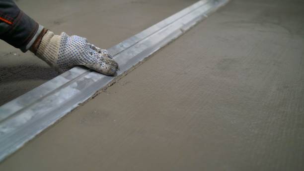 istock Made floor with building gray grout. Plaster dark black gray Construction Soft blur 1240210921