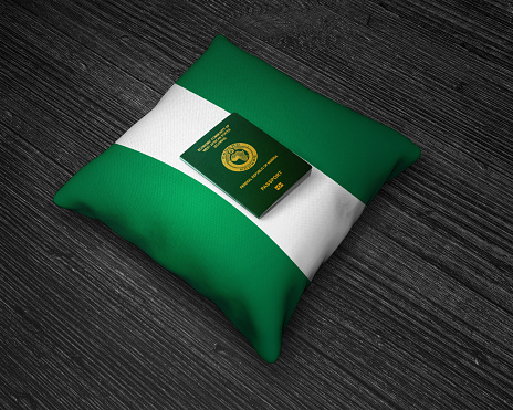 passport of Nigeria with Nigerian flag pillow