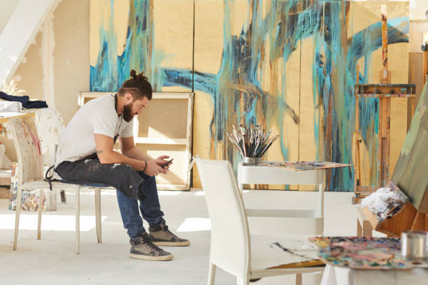 istock Contemporary Male Artist in Studio 1240227633