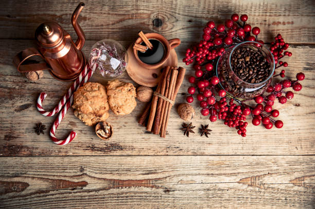 istock Black coffee with cookies cinnamon and spice 1240231490