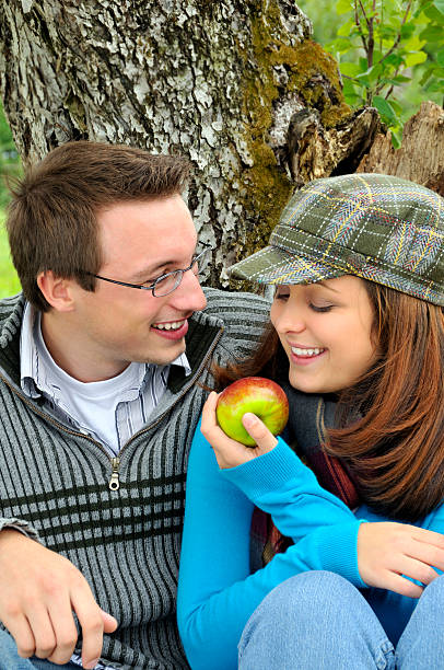 istock Loving Couple Share an Apple 124024066
