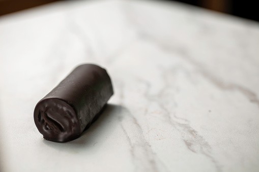 Snack cake roll on a marble counter