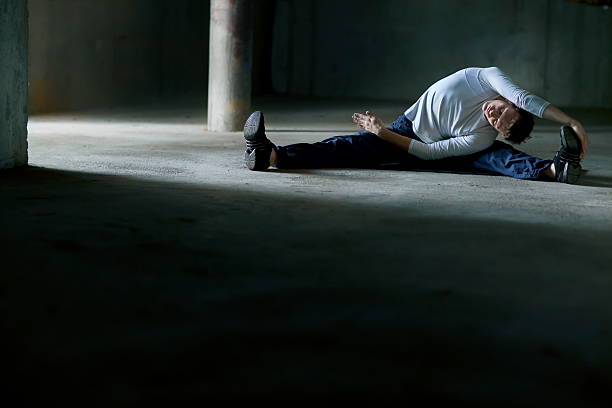 istock streching man on parking lot 124028536