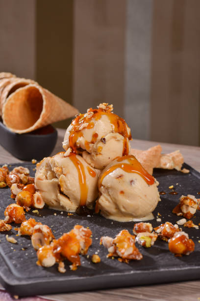 istock croquant icecream is in the black flat stone cup on the brown background 1240288333