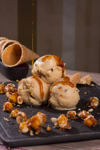 istock croquant icecream is in the black flat stone cup on the brown background 1240292878