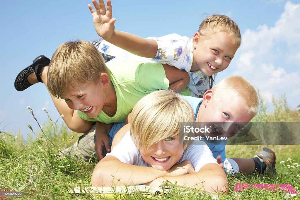Funny kids Group of different children having good summertime Adolescence Stock Photo