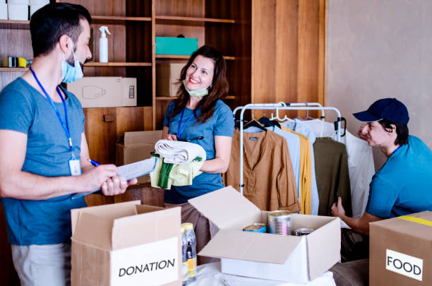 istock Teamwork at homeless shelter 1240305596