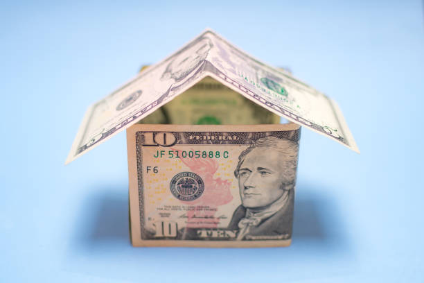 istock money background forming a house with banknotes 1240306675