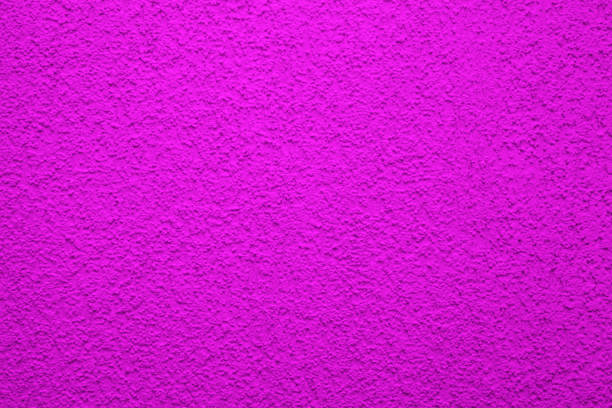 istock Bright, colorful concrete wall texture, painted background - pink color. Wallpaper plaster. 1240329431