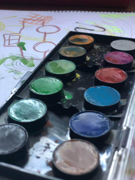 istock kid watercolor painting 1240334445