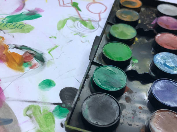 istock kid watercolor painting 1240339232