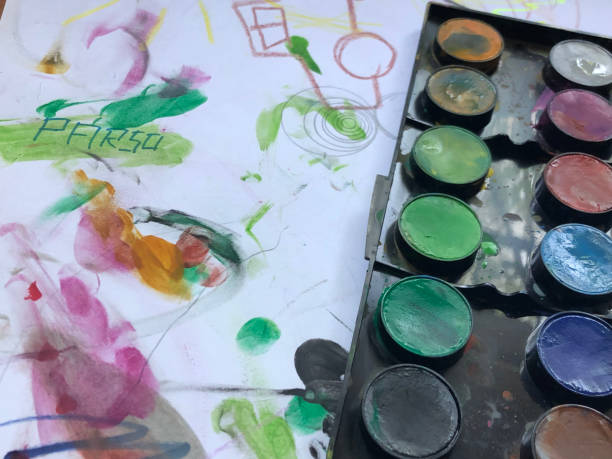istock kid watercolor painting 1240340276
