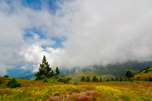 Blue sky, clouds and fog in the Pyrenees