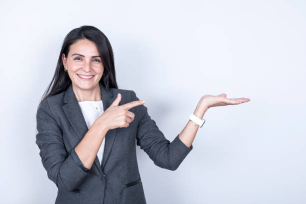 istock young businesswoman showing up 1240400941