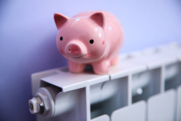 istock piggy bank with heater 1240401132