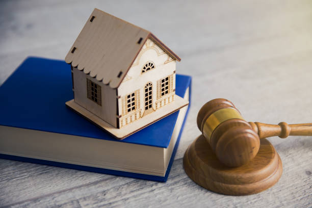 istock house model on book with judge 1240405655