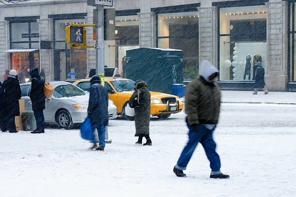 Pedestrians trudge through a snowstorm in New York City -- photographed near Manhattan's Union Square.