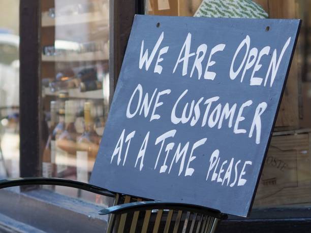istock COVID-19 Signage, Social Distancing when Shopping 1240476545