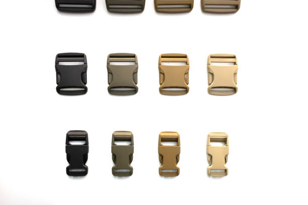 assorted plastic buckles isolated on white background assorted plastic buckles isolated on white background buckle photos stock pictures, royalty-free photos & images