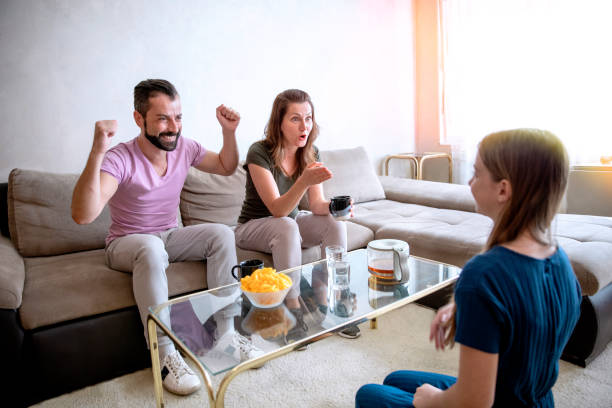 istock Playing guessing game with parents at home 1240486701