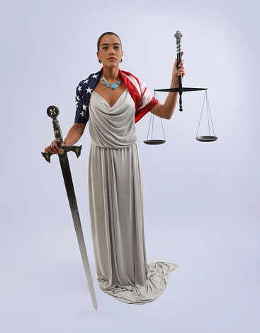 African American Lady Justice with American flag