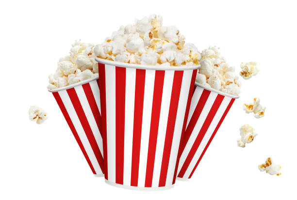 istock Delicious popcorn in red striped carton cups on white 1240513400