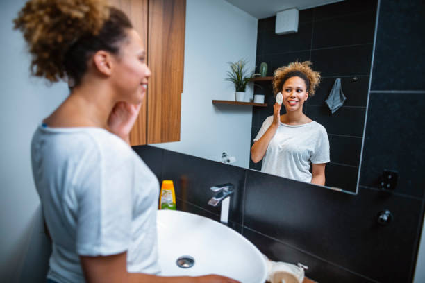 istock Beautiful Mixed Race African Woman Doing her routine in bathroom 1240577015