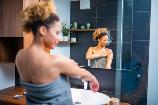 istock Beautiful Mixed Race African Woman Doing her routine in bathroom 1240577525