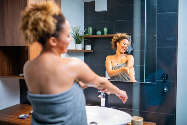 istock Beautiful Mixed Race African Woman Doing her routine in bathroom 1240578031