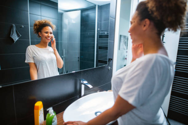 istock Beautiful Mixed Race African Woman Doing her routine in bathroom 1240578566