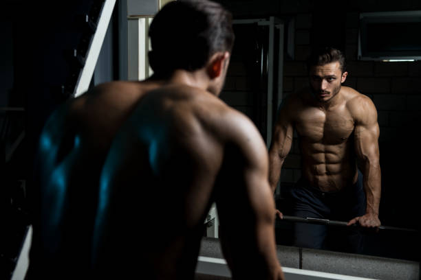 istock Muscular Man After Exercise Resting In Gym 1240649561