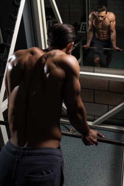 istock Attractive Young Man Resting In Gym Afther Exercise 1240649564