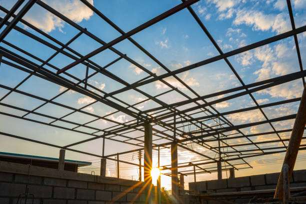 Structural steel roof using steel frames of building residential at evening Structural steel roof using steel frames of building residential at evening structural steel stock pictures, royalty-free photos & images