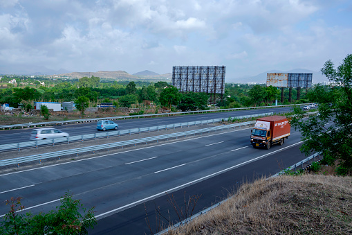 Pune, India - June 16 2019: The Mumbai Pune Expressway early morning near Pune India. The Expressway is officially called the Yashvantrao Chavan Expressway.