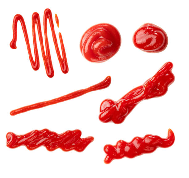 istock Ketchup of various shapes laid on a white background 1240897361