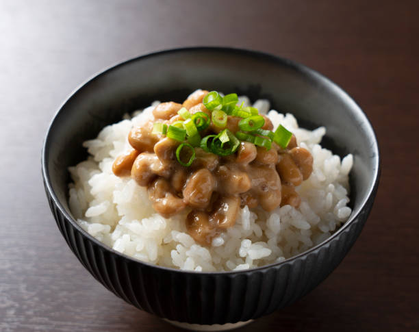 istock Natto and rice set against a dark wooden background 1240908125