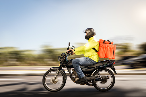 Delivery biker working.