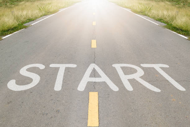 istock Start word writen on asphalt road with natural background. 1240969962